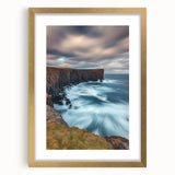 Elegant gold-framed landscape artwork featuring majestic cliffs, complete with a white mat, ideal for home decor or office settings. Perfect for nature lovers.