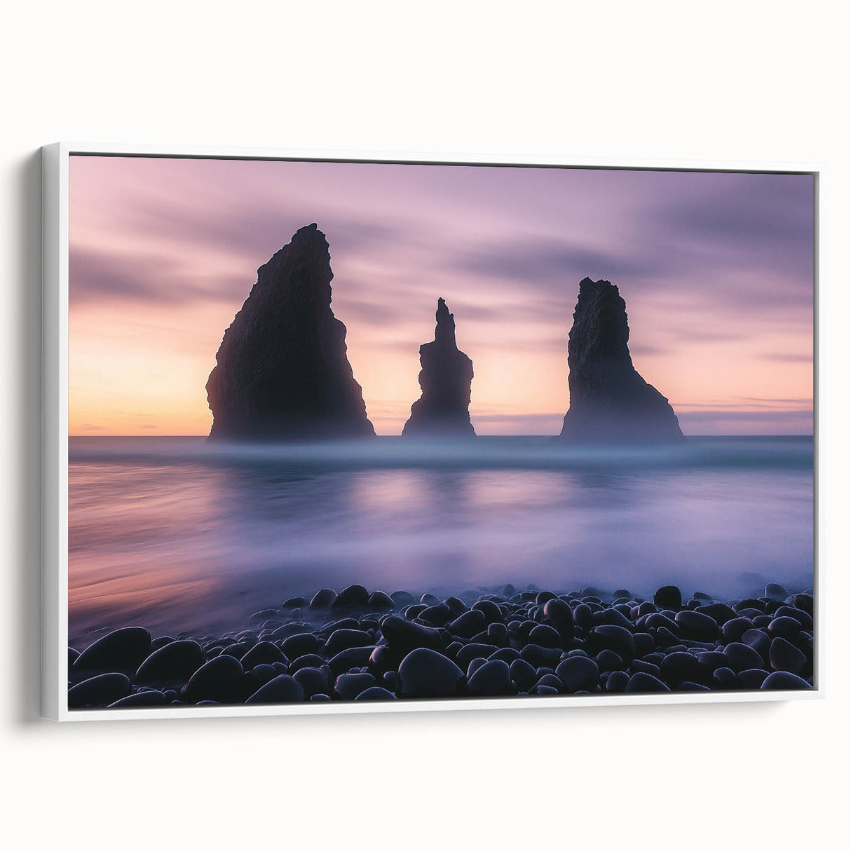 Framed canvas artwork showcasing a breathtaking cliff landscape with vibrant colors, displayed in a sleek white frame, adding elegance to any decor.