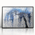 Framed acrylic artwork showcasing an abstract design of colorful splatters on a black background, ideal for modern home decor. The piece adds vibrant energy and creativity to any space.