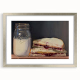 Textured art print of abstract pastries in muted earth tones, framed in silver, ideal for bedroom wall decor.