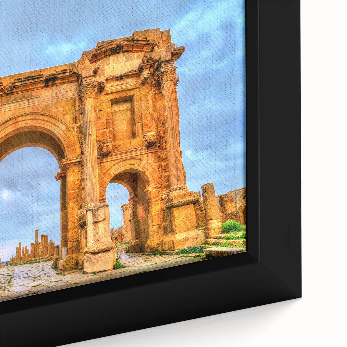 Extra large framed canvas featuring a textured depiction of an Algerian landscape in black with colorful accents.