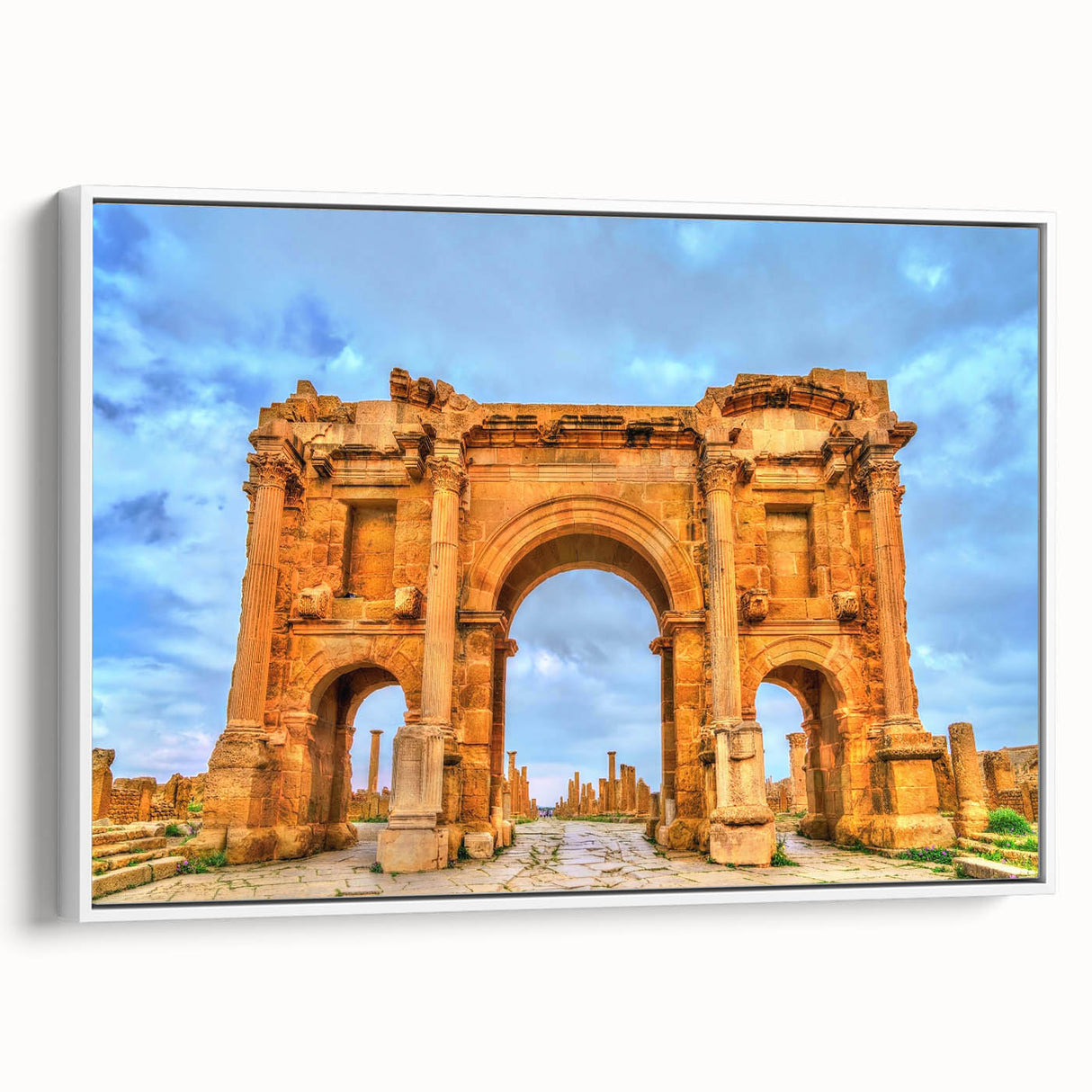 Framed canvas depicting an Algerian landscape in vintage poster style with muted earth tones, ideal for bedroom wall decor.