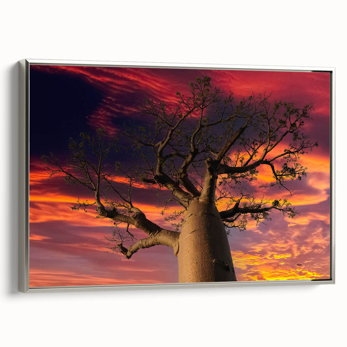 Vintage poster art of a Madagascar scenery in vibrant colors on a large framed canvas, ideal for living room decor.