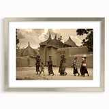 Abstract art print of Mali scenery with muted earth tones in a silver frame, ideal for dining room decor.