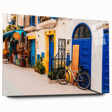 Large abstract wall art of a Moroccan scenery in earthy tones on acrylic glass, suitable for bedroom or dining room decor.