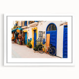 Extra large abstract art print featuring textured Moroccan scenery in earth tones, framed with a white mat.