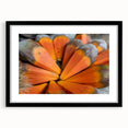 Extra large abstract art print of a colorful Seychelles scenery on textured canvas, framed in black.