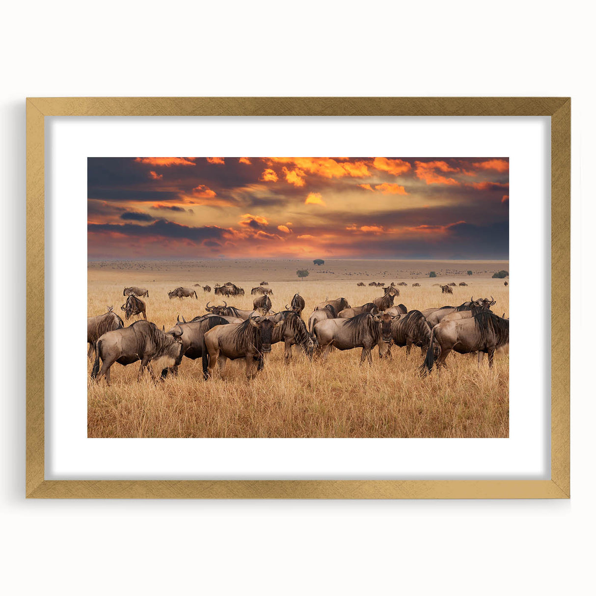 Abstract art print of African Tanzanian scenery in muted earth tones, framed in gold, ideal for dining room decor.