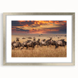 Extra large abstract art print of African scenery in silver frame, featuring textured earth tones.