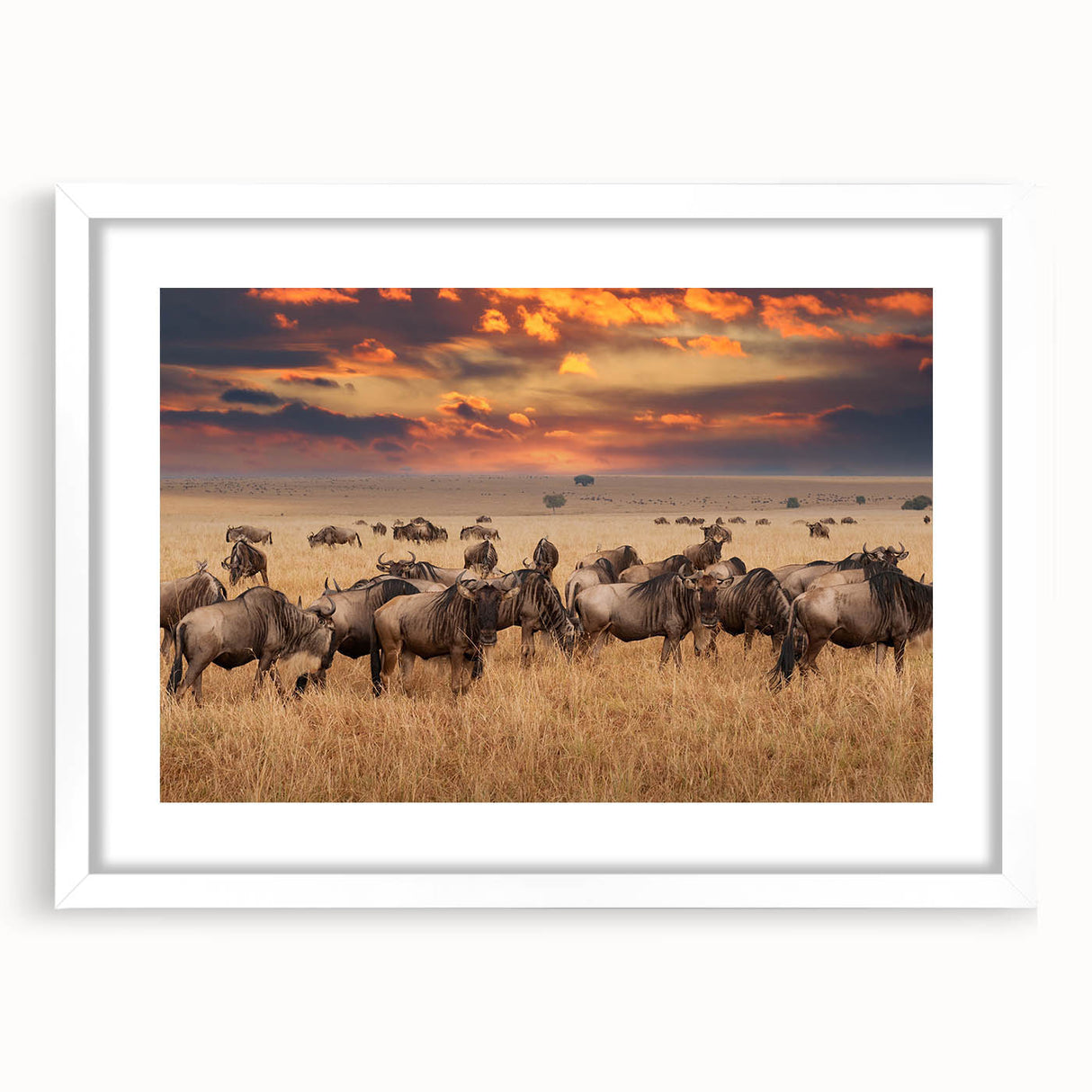 Textured abstract art print of an African landscape in earth tones on a framed white matte, ideal for bedroom art.