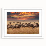 Textured abstract art print of an African landscape in earth tones on a framed white matte, ideal for bedroom art.