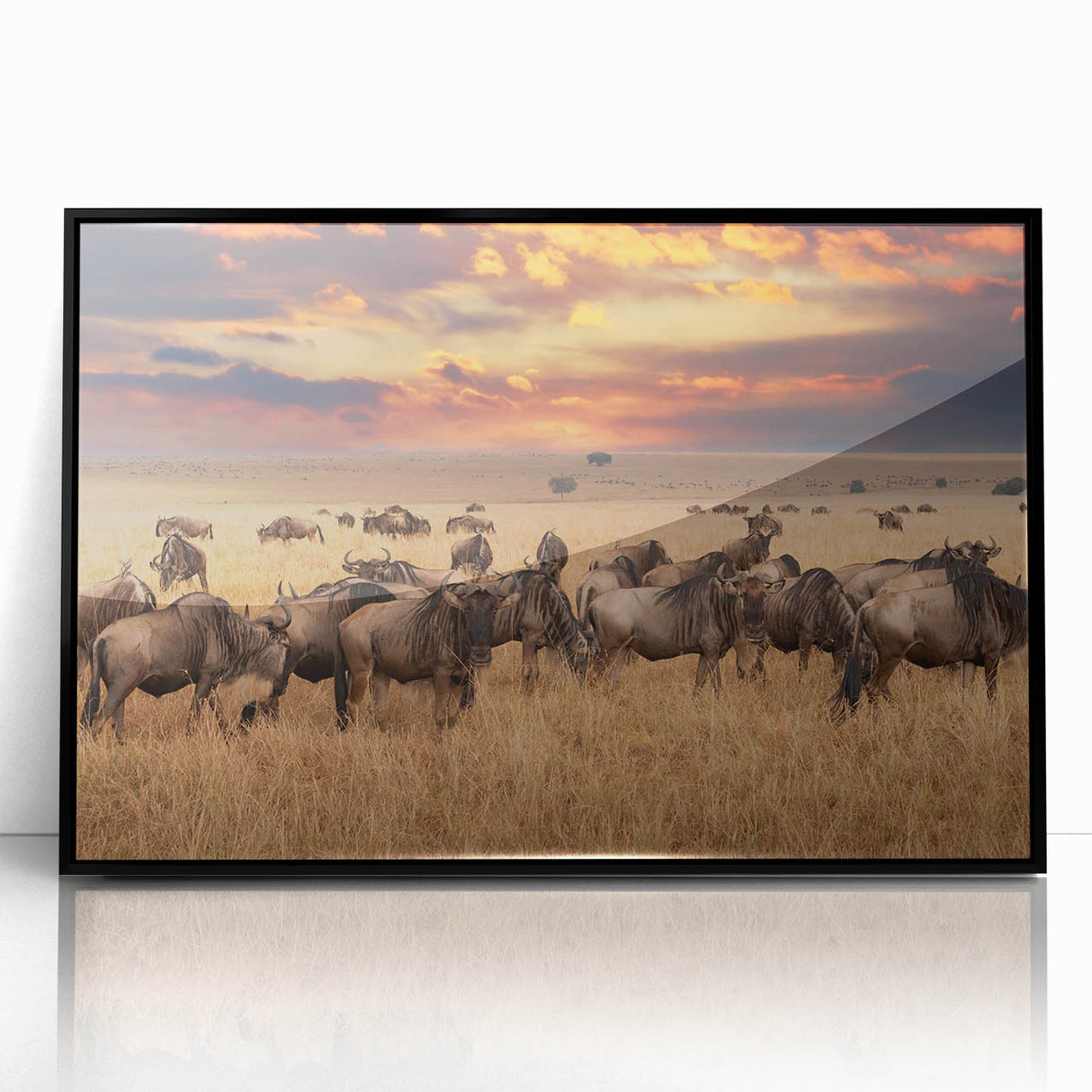 Large abstract wall art depicting a Tanzanian scenery in muted earth tones, framed in black acrylic.