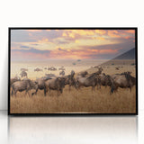 Large abstract wall art depicting a Tanzanian scenery in muted earth tones, framed in black acrylic.