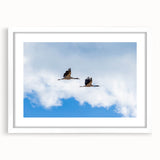 Abstract art print of Bhutan scenery in muted earth tones, framed with a white mat, ideal for dining room decor.