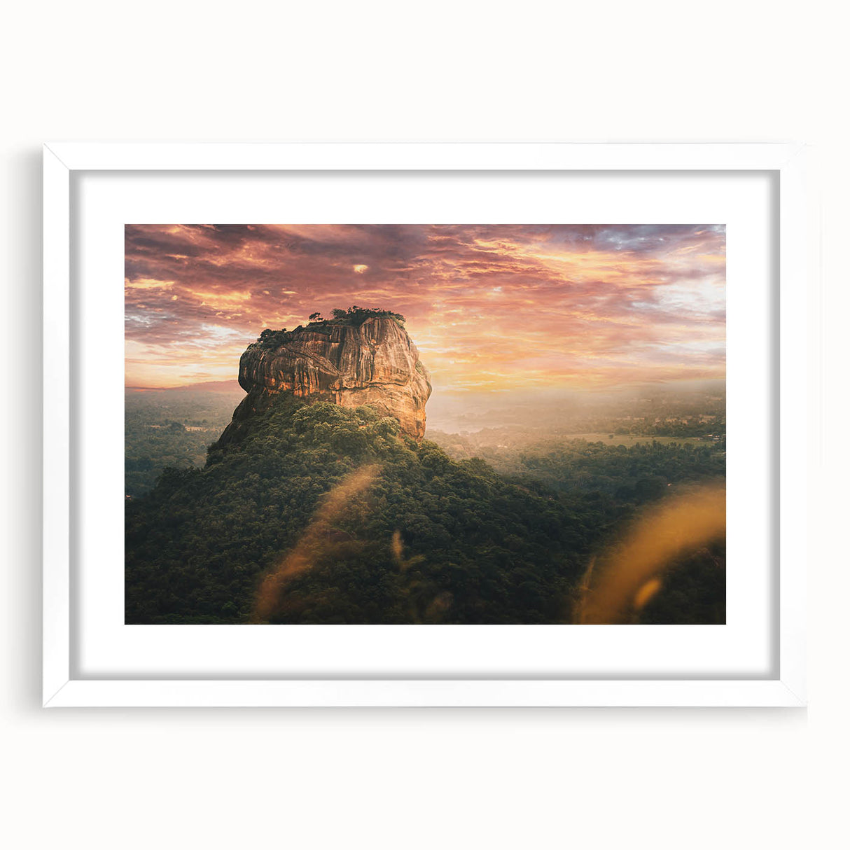 Abstract art print depicting a serene Sri Lankan landscape in muted green and blue tones, framed with a white mat.