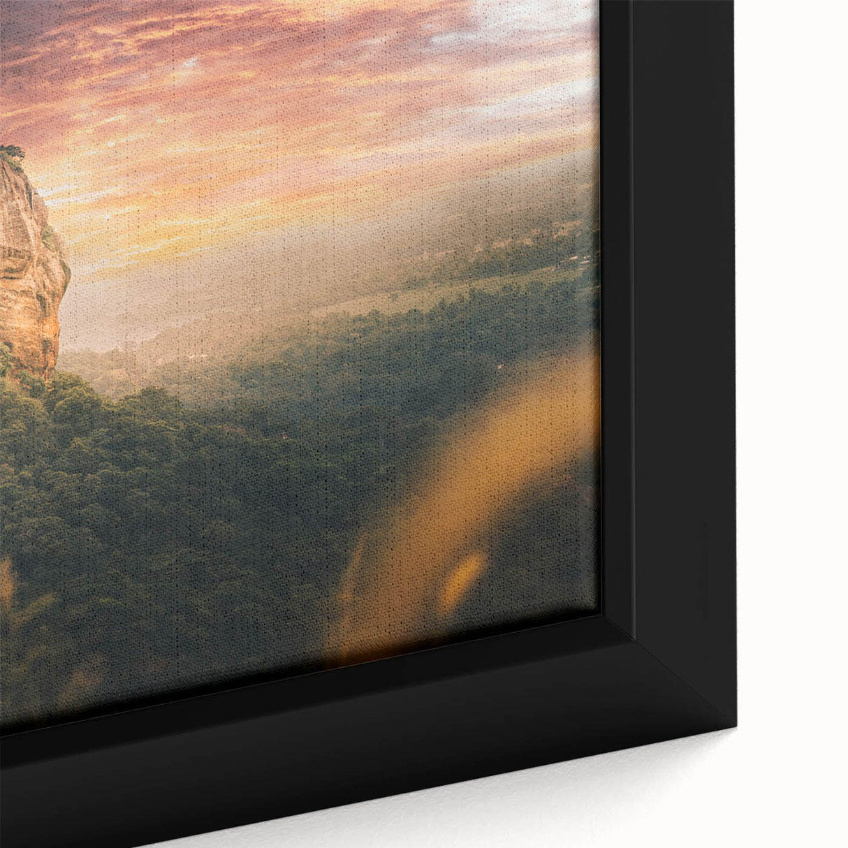 Close-up of a black wall art featuring a colorful, textured Sri Lankan landscape on a framed canvas.