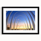 Extra large textured abstract art print of colorful, swirling patterns on a framed black canvas, ideal for living room decor.