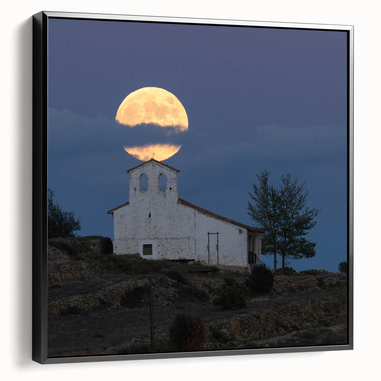 Black and white framed canvas of a vintage Caribbean landscape, ideal for bedroom decor.
