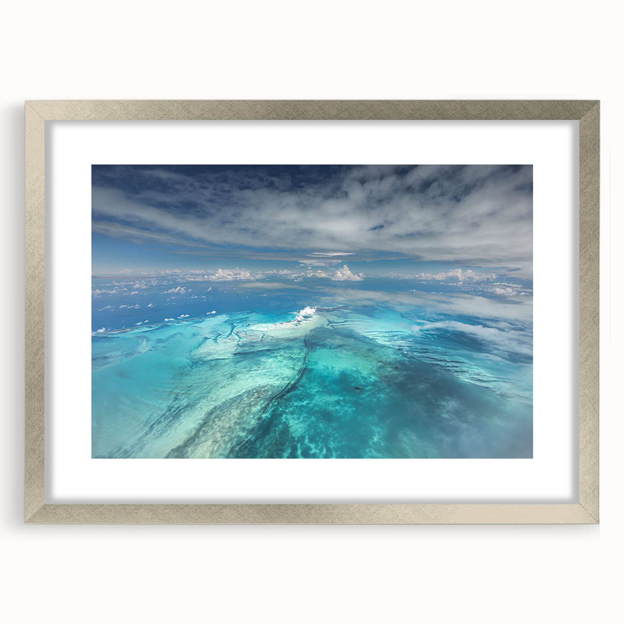 Extra large framed wall art depicting an abstract Caribbean seascape in textured blues and greens.