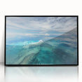 Large abstract wall art depicting a Caribbean seascape in vibrant blue tones on a framed acrylic.