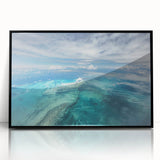Large abstract wall art depicting a Caribbean seascape in vibrant blue tones on a framed acrylic.