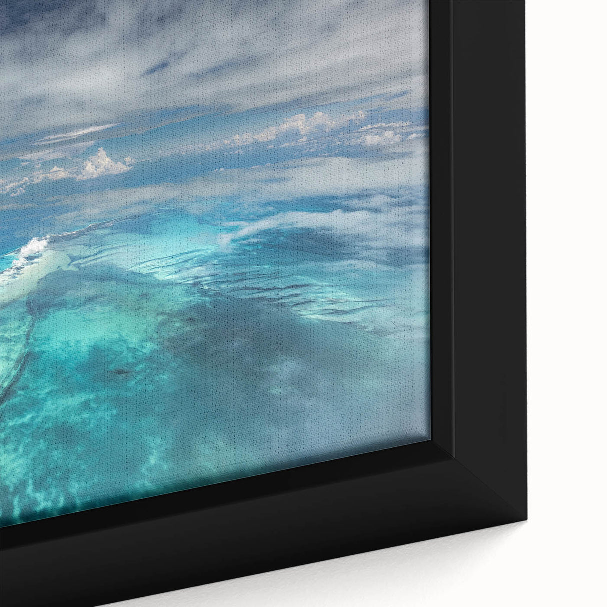 Extra large framed canvas featuring a textured depiction of a Caribbean scenery in black with vibrant color accents.