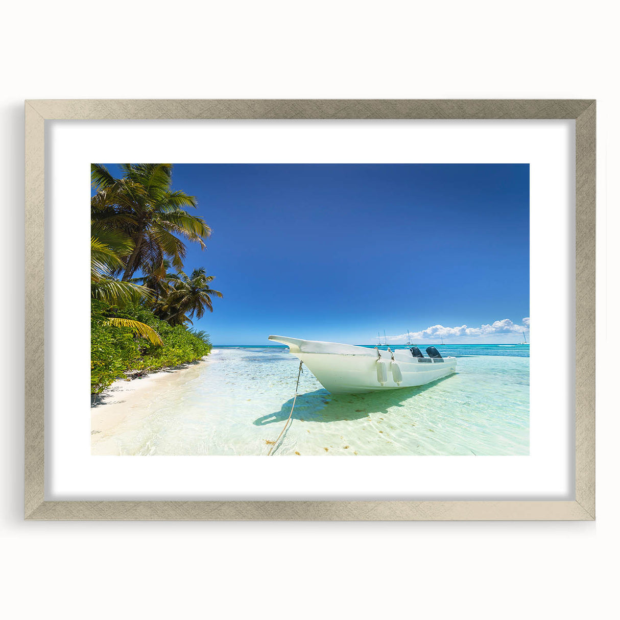 Extra large abstract art print of Caribbean scenery in a silver frame, featuring textured blues and greens.