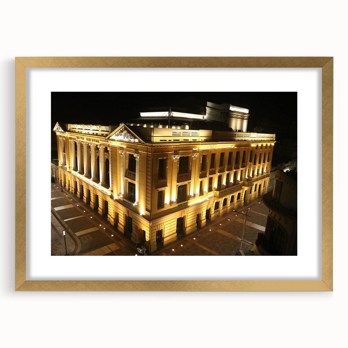 Extra large abstract art print of Central American scenery in gold frame, featuring textured hues of green and blue.