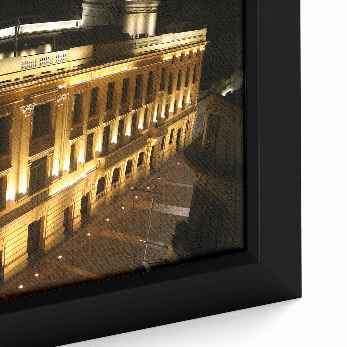 Extra large framed canvas featuring a textured depiction of a Central American scenery in black with colorful art accents.
