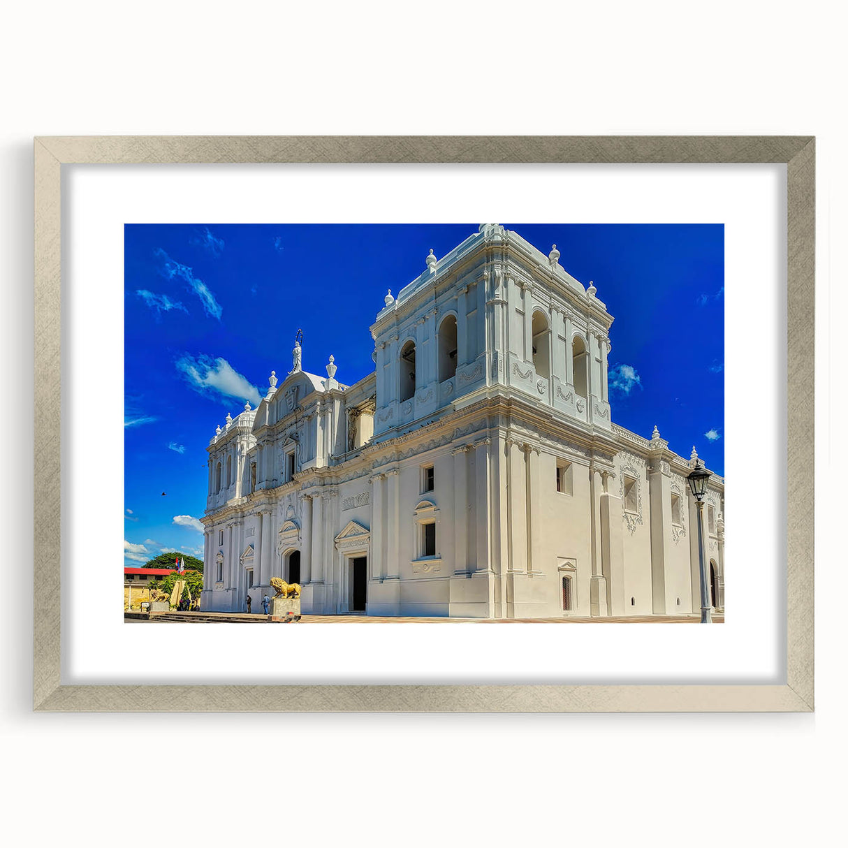 Textured art of abstract Central American scenery in muted earth tones on a framed silver mat, ideal for bedroom art.