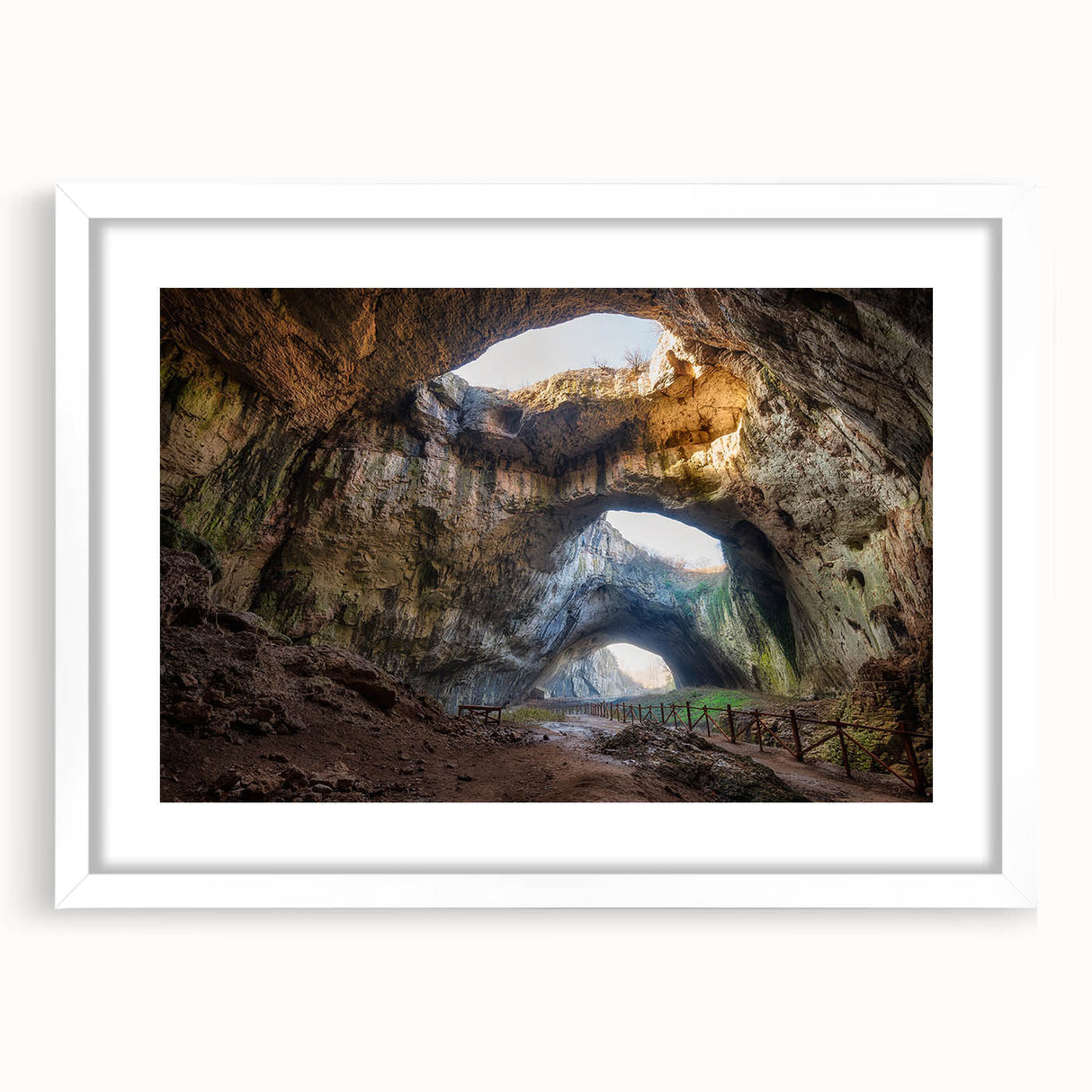 Textured abstract art print of a European scenery in muted earth tones on a framed white mat, ideal for bedroom art.