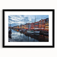 Extra large abstract art print of a colorful, textured European scenery on a black framed canvas.