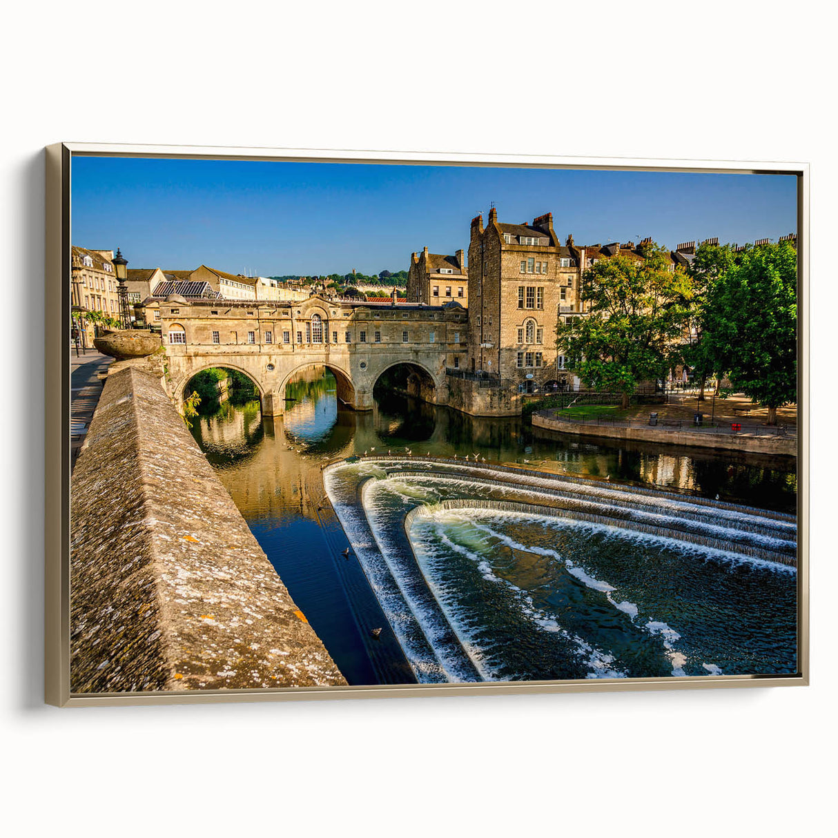 Framed canvas of a vintage-style landscape painting depicting Bath, England, in muted gold and black tones.