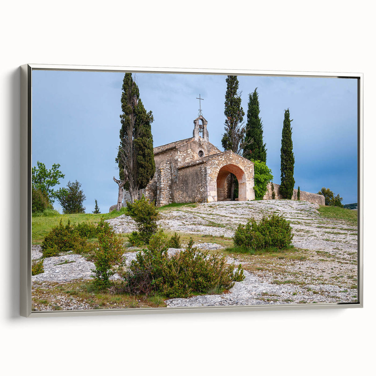 Framed canvas featuring a vintage landscape painting of Southern France with vibrant.