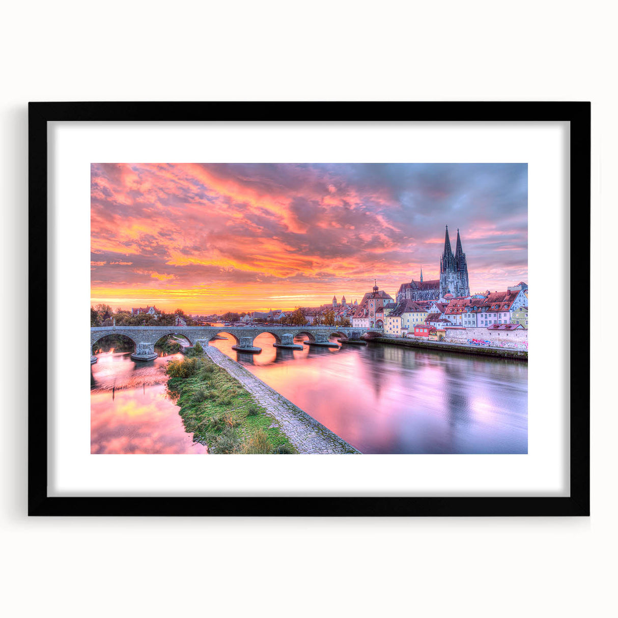 Extra large abstract art print of a colorful Bavarian landscape on textured canvas, framed in black.