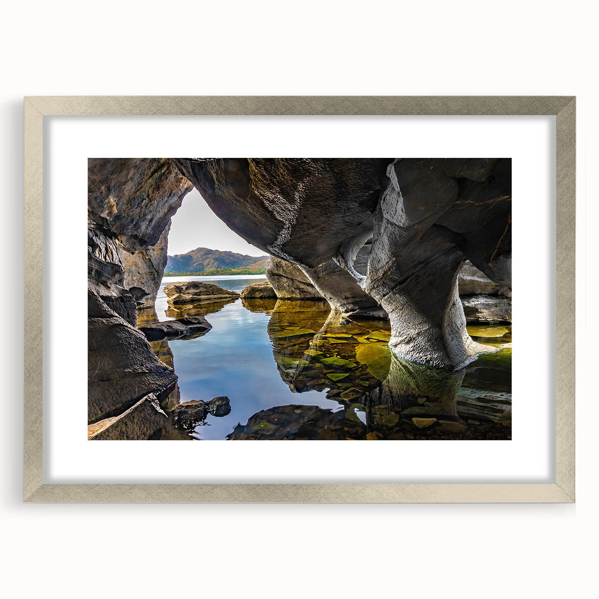 Extra large abstract art print of an Irish landscape in textured grays and greens, framed in silver.