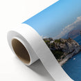 Art deco poster of Capri, Italy in muted blue and white tones on rolled canvas, ideal for nursery wall art or dining room.