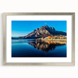 Extra large abstract print of Lake Como with textured details in muted blues and greens, framed in silver.