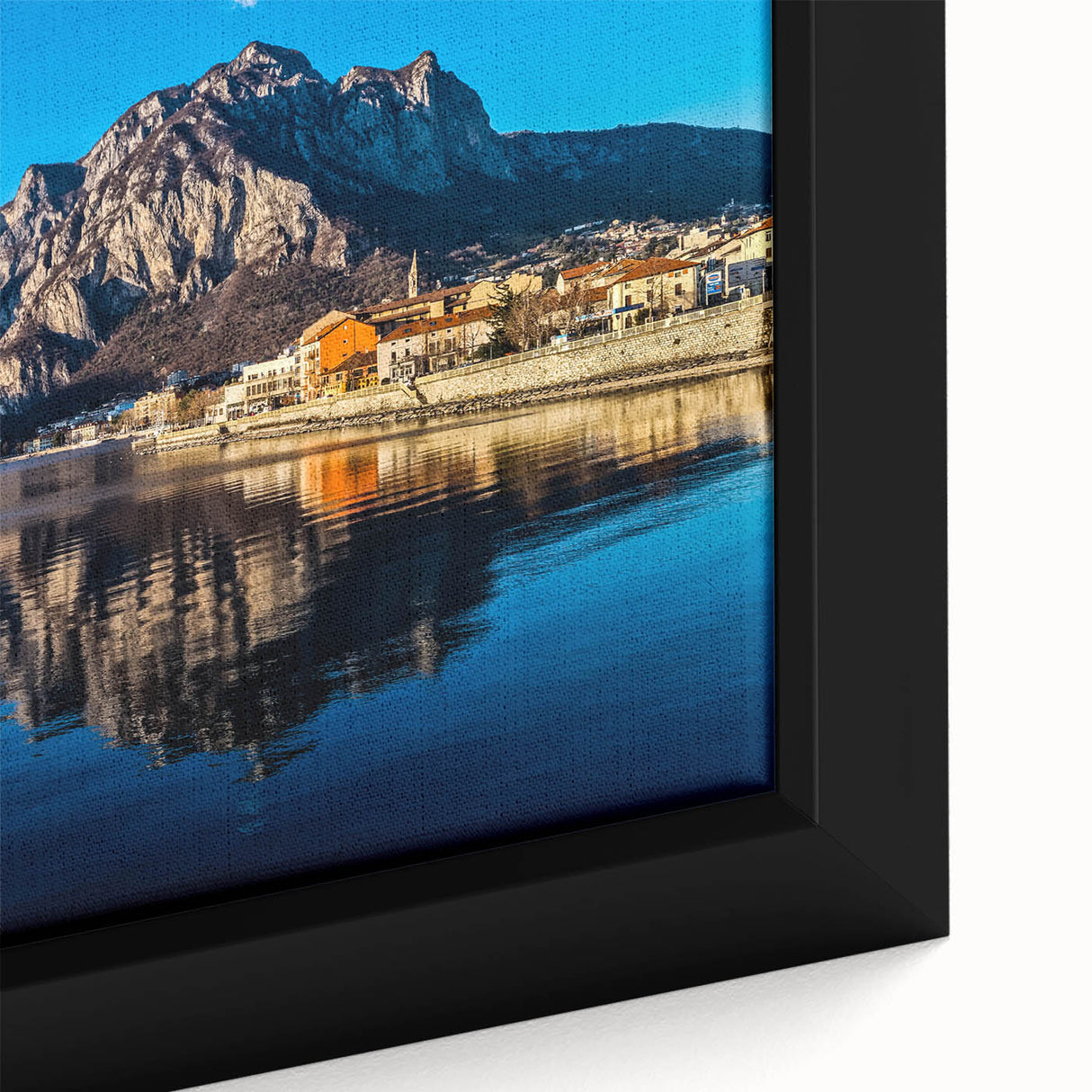Extra large framed canvas of Lake Como with textured black and colorful art, ideal for living room decor.