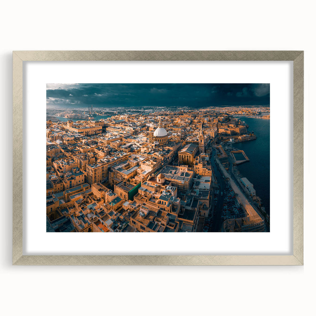 Extra large abstract art print of a European Malta scenery in muted earth tones, framed in silver.