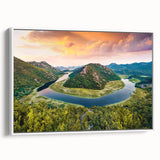 Vintage poster art of a scenic European landscape on a large framed canvas.
