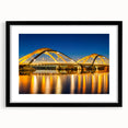 Extra large abstract art print of Amsterdam with vibrant colors and textures on a black framed canvas.