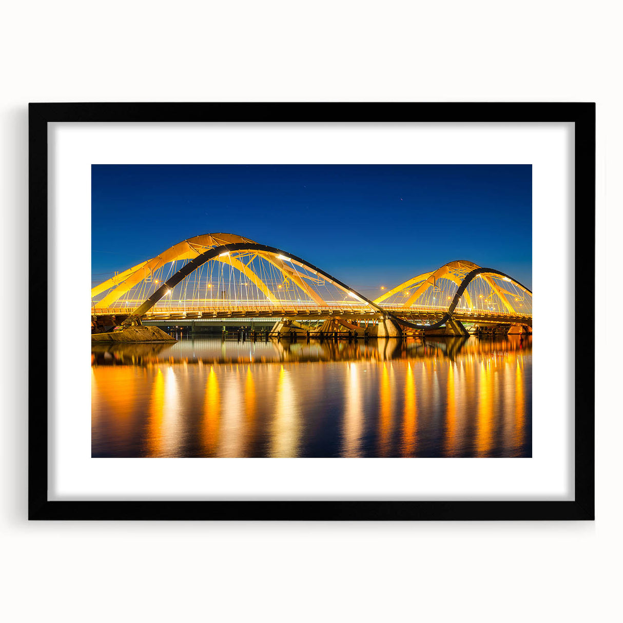 Extra large abstract art print of Amsterdam with vibrant colors and textures on a black framed canvas.