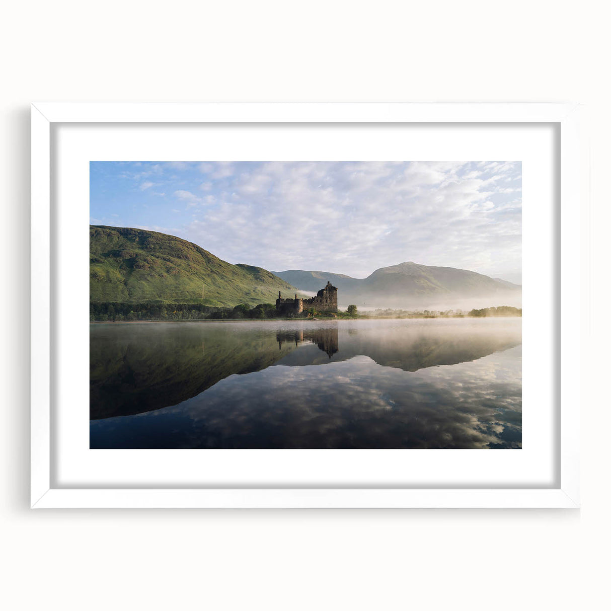 Abstract art print of a Scottish landscape in muted green and blue tones, framed with a white mat.