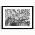 Colorful abstract art print of Andalusian scenery in vibrant hues on a large textured canvas, framed in black.