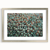 Extra large abstract art print of a textured European scenery in muted earth tones, framed in silver.