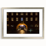 Textured abstract art print depicting a serene Stockholm scenery in muted blues and grays, framed in silver.