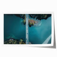Rolled print of a Swiss landscape with lush greenery and mountain backdrop, suited for art wall dining room.