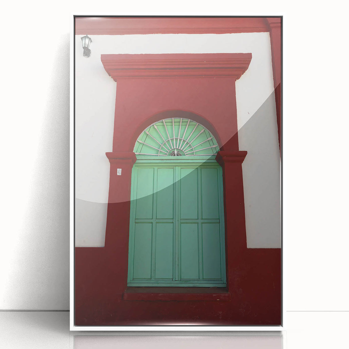 Art deco poster of Baja California scenery in muted blue and white tones, acrylic print framed in white.