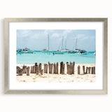 Textured abstract art print depicting a muted blue and green Mexican landscape, framed in silver, ideal for bedroom art.